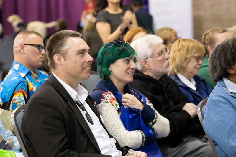 Attendees of the Brain Health Fair listening to a presentation