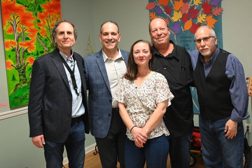 From the left to right: Alan Ettinger (saxophonist), Paul Block (keyboardist), Kelsey Demsky (vocalist), Rick Corwin (drums), and Bob Scollo (bass).