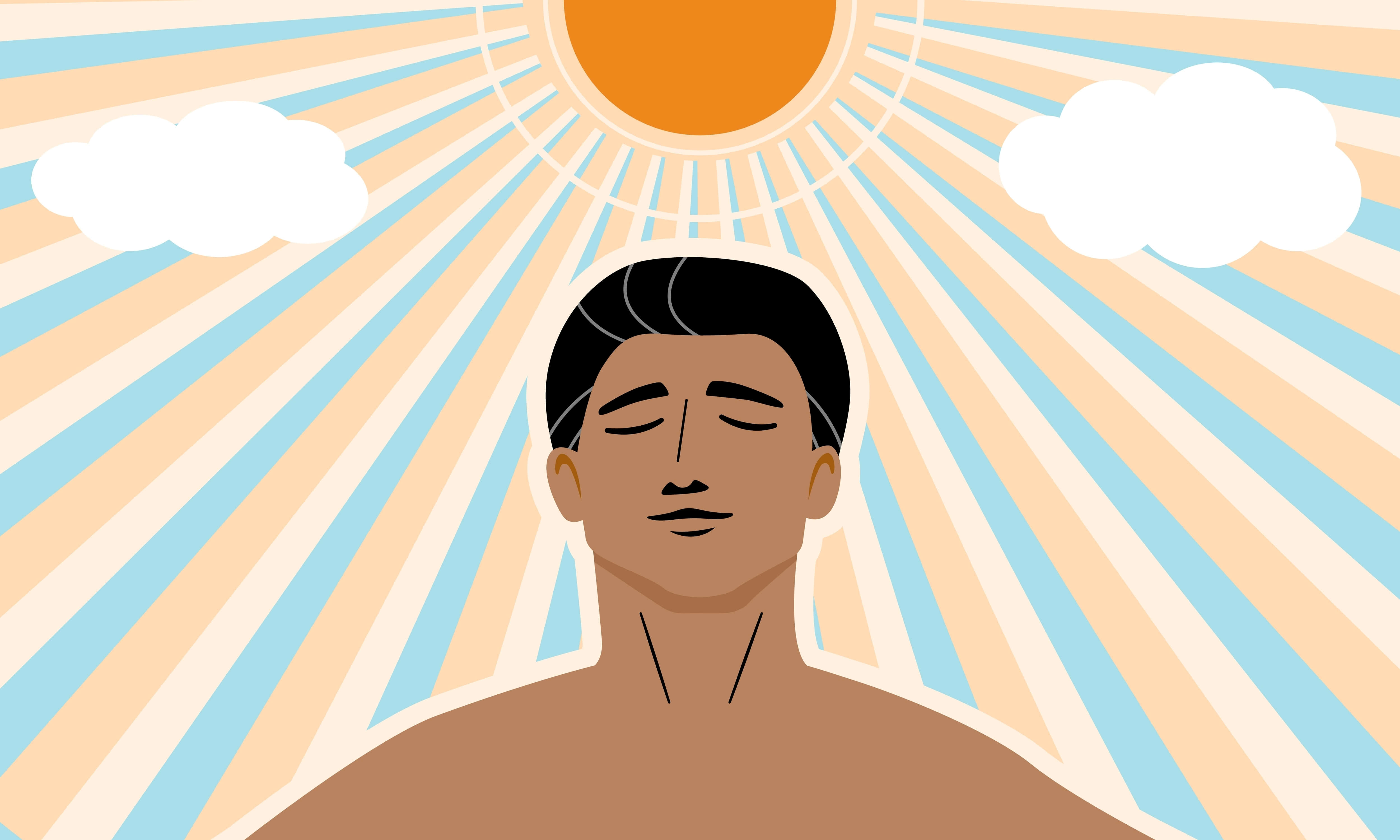 A tan skin man under the sunshine to get more vitamin D from the sun light.
