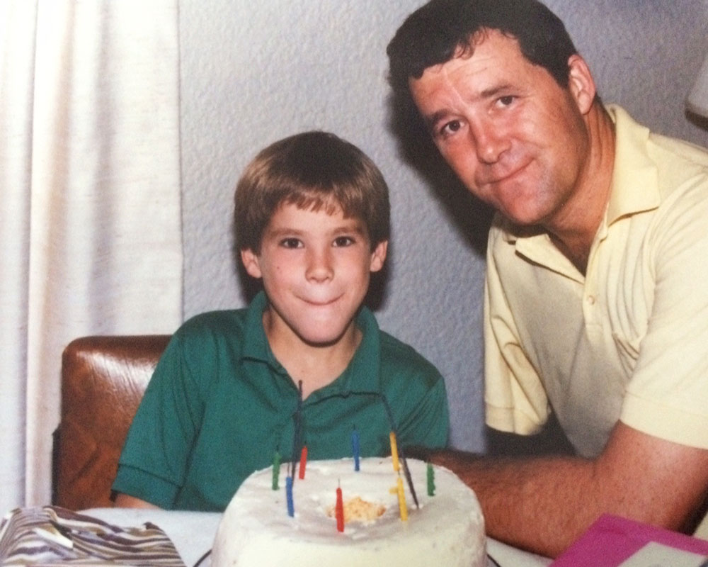 Ryan Reynolds celebrating his birthday as a child with his father